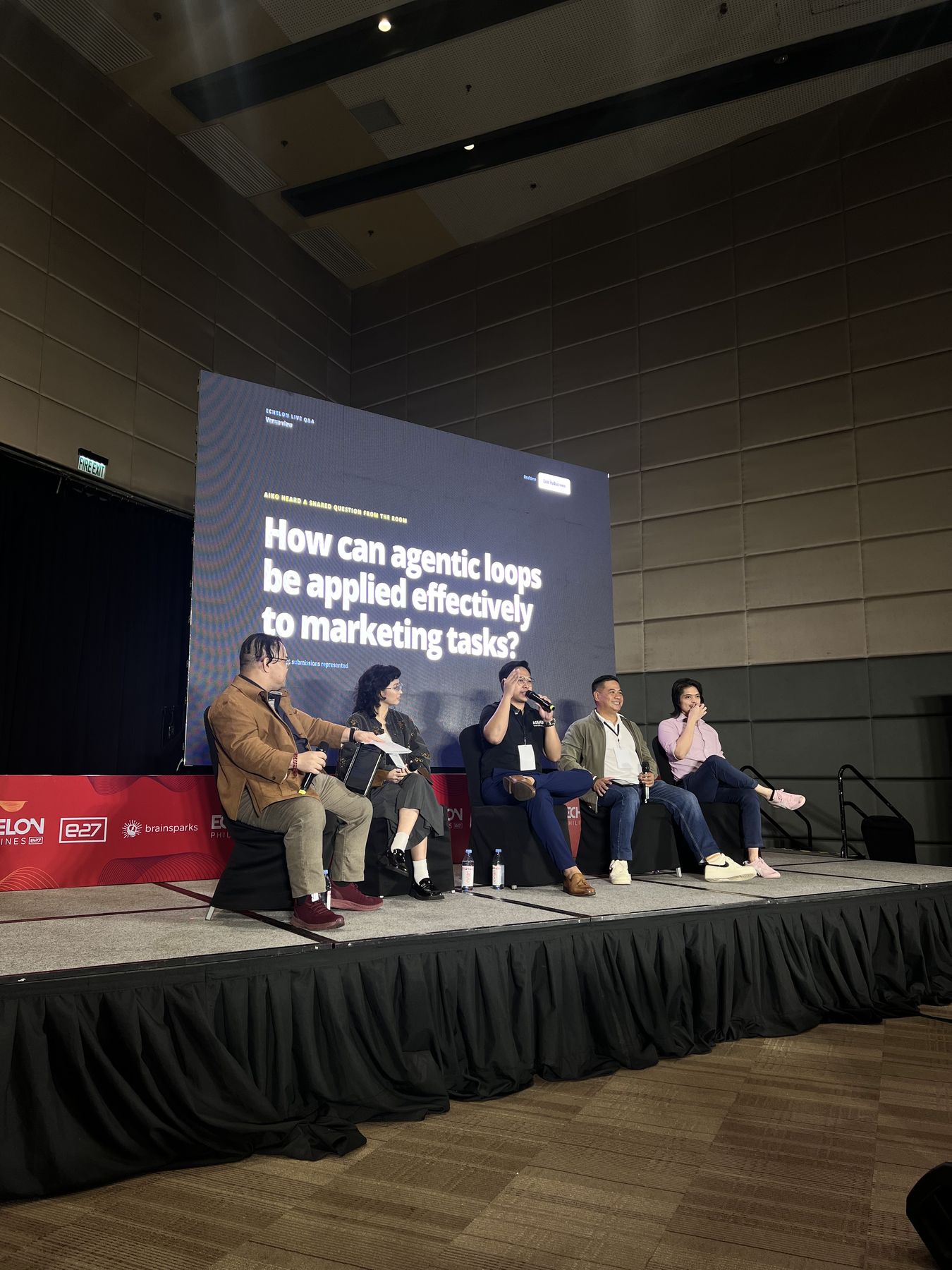 Clarry Herrera speaking on a panel about agentic loops in marketing